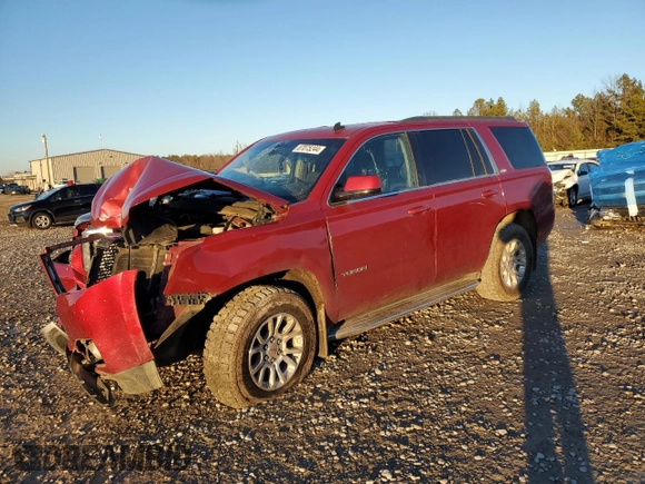2015 GMC Yukon SLE with VIN 1GKS2AKC2FR190537, listed as a Copart auction lot 87075244 with 244,267 mi miles and Salvage Title. Bid and sale history available at carsss.com. Image 1.