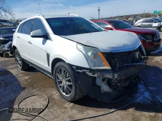 2014 Cadillac SRX Performance Collection with VIN 3GYFNCE31ES646075, listed as a IAAI auction lot 41856378 with 172,379 mi miles. Bid and sale history available at carsss.com. Image 1.