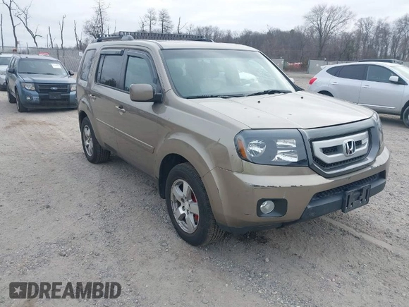 2011 Honda Pilot EX-L with VIN 5FNYF4H68BB038615, listed as a IAAI auction lot 41785830 with 164,324 mi miles and . Bid and sale history available at carsss.com. Image 1.