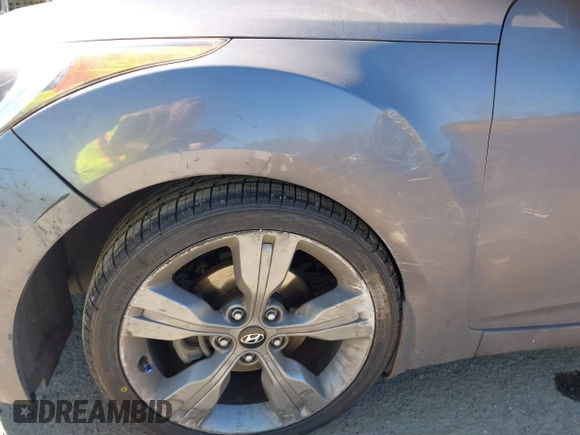 2013 Hyundai Veloster w/Black Int with VIN KMHTC6AD8DU103122, listed as a IAAI auction lot 42068175 with 123,512 mi miles and . Bid and sale history available at DreamBid. Image 6.