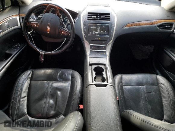 2016 Lincoln MKZ z VIN 3LN6L2G97GR614647, wystawiony jako Copart lot #55955655 z przebiegiem 142 655 mil mil oraz Szkoda całkowita • Salvage title. Historia ofert i sprzedaży dostępna na DreamBid. Obrazek 8.