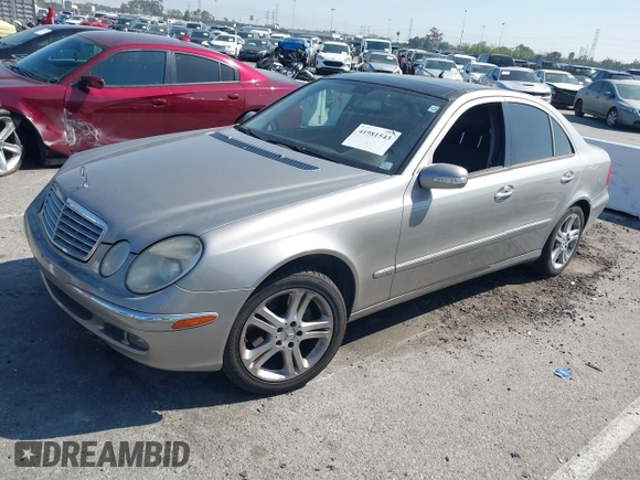 2006 Mercedes-Benz E-Class 3.5L with VIN WDBUF56J96A838185, listed as a IAAI auction lot 41981543 with 213,431 mi miles. Bid and sale history available at carsss.com. Image 2.