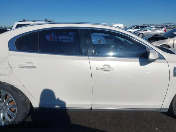 2009 Lincoln MKS z VIN 1LNHM93RX9G618156, wystawiony jako IAAI lot #41054366 z przebiegiem 127 060 mil mil oraz . Historia ofert i sprzedaży dostępna na DreamBid. Obrazek 14.