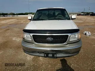 1999 Ford F-150 XL z VIN 1FTRX07L1XKA55123, wystawiony jako Copart lot #54382225 z przebiegiem Nie podano mil oraz Szkoda całkowita • Salvage title. Historia ofert i sprzedaży dostępna na DreamBid. Obrazek 13.