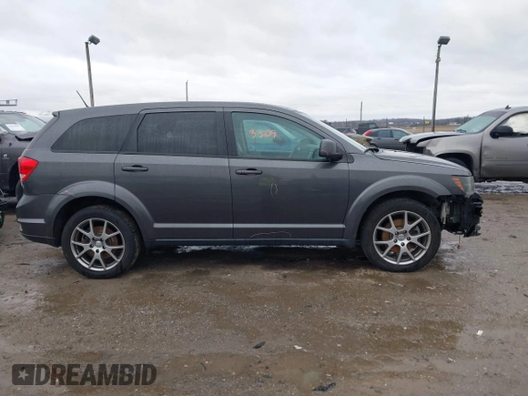2015 Dodge Journey R/T z VIN 3C4PDDEG4FT680609, wystawiony jako IAAI lot #41733309 z przebiegiem 124 121 mil mil oraz . Historia ofert i sprzedaży dostępna na DreamBid. Obrazek 13.