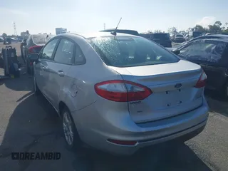 2016 Ford Fiesta SE with VIN 3FADP4BJ6GM205412, listed as a IAAI auction lot 41809126 with 100,941 mi miles. Bid and sale history available at carsss.com. Image 3.
