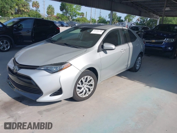 2018 Toyota Corolla L z VIN 5YFBURHE2JP827894, wystawiony jako IAAI lot #42295741 z przebiegiem 44 171 mil mil oraz . Historia ofert i sprzedaży dostępna na DreamBid. Obrazek 17.