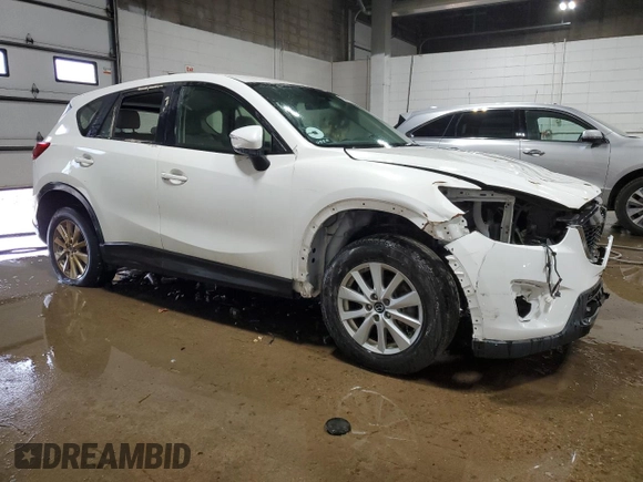 2015 Mazda CX-5 Sport with VIN JM3KE4BY4F0551679, listed as a Copart auction lot 68471374 with 198,987 mi miles and Non Repairable. Bid and sale history available at carsss.com. Image 4.