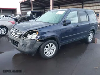 2006 Honda CR-V EX with VIN JHLRD788X6C011242, listed as a IAAI auction lot 41714756 with 199,074 mi miles. Bid and sale history available at carsss.com. Image 17.