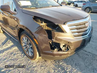 2017 Cadillac XT5 Luxury AWD with VIN 1GYKNDRS5HZ319787, listed as a IAAI auction lot 40819077 with 83,510 mi miles and . Bid and sale history available at DreamBid. Image 6.