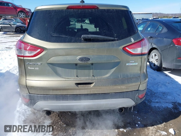 2013 Ford Escape SE with VIN 1FMCU0GX4DUC60741, listed as a IAAI auction lot 41592770 with 121,972 mi miles and . Bid and sale history available at DreamBid. Image 16.