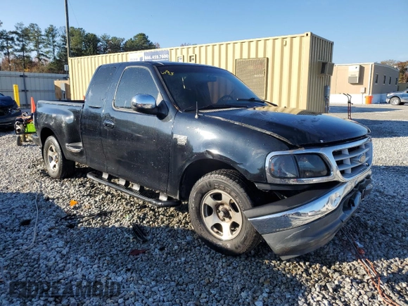 1999 Ford F-150 XL with VIN 2FTRX07W0XCA08082, listed as a Copart auction lot 82246214 with 189,950 mi miles and Salvage title. Bid and sale history available at DreamBid. Image 4.