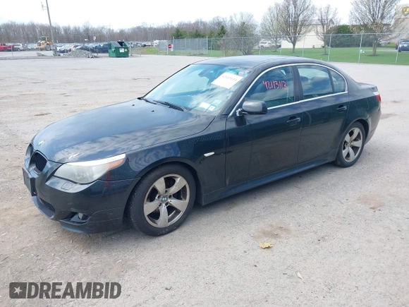 2007 BMW 5 Series 530i with VIN WBANE73597CM56897, listed as a IAAI auction lot 42113113 with 212,774 mi miles. Bid and sale history available at carsss.com. Image 2.