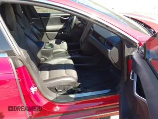 2018 Tesla Model S 75D with VIN 5YJSA1E2XJF295777, listed as a IAAI auction lot 41694540 with 70,428 mi miles and . Bid and sale history available at DreamBid. Image 5.