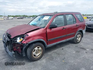 2004 Honda CR-V LX with VIN SHSRD68404U208241, listed as a IAAI auction lot 38916501 with 203,016 mi miles and . Bid and sale history available at carsss.com. Image 2.