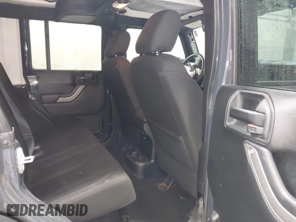 2018 Jeep Wrangler JK Unlimited Sport with VIN 1C4BJWDG9JL890272, listed as a IAAI auction lot 41551844 with 77,655 mi miles. Bid and sale history available at carsss.com. Image 8.