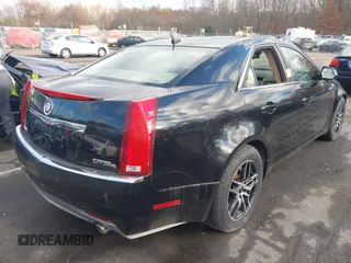 2008 Cadillac CTS AWD w/1SB with VIN 1G6DT57V980206276, listed as a IAAI auction lot 40822684 with 142,690 mi miles. Bid and sale history available at carsss.com. Image 4.