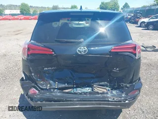 2017 Toyota RAV4 LE with VIN JTMBFREV8HJ168975, listed as a IAAI auction lot 42139354 with 91,394 mi miles and . Bid and sale history available at DreamBid. Image 16.