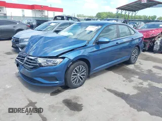 2021 Volkswagen Jetta S z VIN 3VWC57BU6MM046066, wystawiony jako IAAI lot #42199064 z przebiegiem 86 394 mil mil oraz . Historia ofert i sprzedaży dostępna na DreamBid. Obrazek 19.