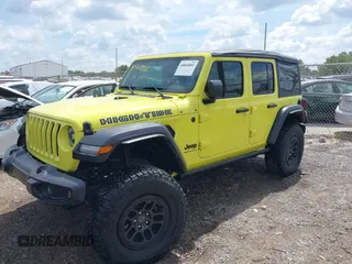 2023 Jeep Wrangler Sport with VIN 1C4HJXDG5PW693865, listed as a IAAI auction lot 40068881 with 12,149 mi miles and . Bid and sale history available at DreamBid. Image 2.