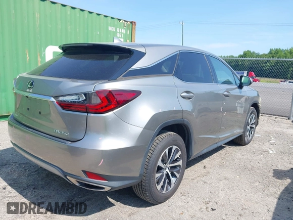 2021 Lexus RX 350 with VIN 2T2AZMAA3MC186617, listed as a IAAI auction lot 42226167 with 133,435 mi miles and . Bid and sale history available at DreamBid. Image 4.