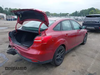 2016 Ford Focus SE with VIN 1FADP3F24GL249455, listed as a IAAI auction lot 40421121 with 49,043 mi miles. Bid and sale history available at carsss.com. Image 4.