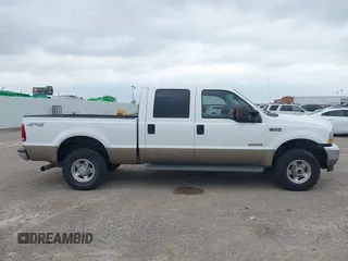 2004 Ford F-250 XL z VIN 1FTNW21P44EA98986, wystawiony jako IAAI lot #42125924 z przebiegiem 144 840 mil mil oraz . Historia ofert i sprzedaży dostępna na DreamBid. Obrazek 13.