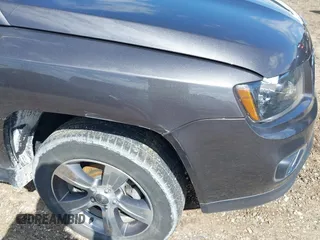 2016 Jeep Compass High Altitude Edition with VIN 1C4NJCEA3GD760934, listed as a IAAI auction lot 42028621 with 102,498 mi miles. Bid and sale history available at carsss.com. Image 6.