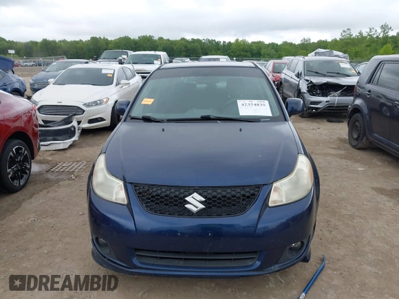 2009 Suzuki SX4 Sport FWD z VIN JS2YC414196200260, wystawiony jako IAAI lot #42354835 z przebiegiem 175 909 mil mil oraz . Historia ofert i sprzedaży dostępna na DreamBid. Obrazek 12.