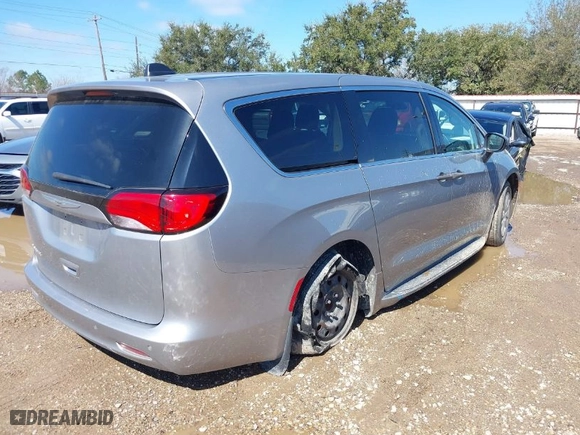 2021 Chrysler Voyager L with VIN 2C4RC1AG7MR554972, listed as a IAAI auction lot 41627734 with 94,084 mi miles. Bid and sale history available at carsss.com. Image 4.