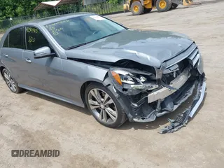 2014 Mercedes-Benz E 350 Sport with VIN WDDHF5KBXEA884338, listed as a IAAI auction lot 42300403 with 101,574 mi miles and . Bid and sale history available at DreamBid. Image 1.