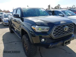 2023 Toyota Tacoma 4WD SR with VIN 3TMCZ5AN4PM605821, listed as a IAAI auction lot 41518268 with 15,400 mi miles. Bid and sale history available at carsss.com. Image 1.