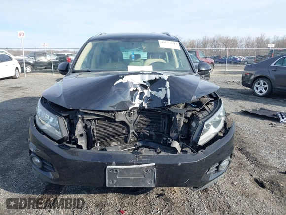 2012 Volkswagen Tiguan SE with VIN WVGAV7AX3CW531264, listed as a IAAI auction lot 41651242 with 190,669 mi miles and . Bid and sale history available at DreamBid. Image 12.