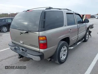 2003 Chevrolet Tahoe LT z VIN 1GNEK13Z53J148280, wystawiony jako IAAI lot #40963535 z przebiegiem 196 726 mil mil oraz . Historia ofert i sprzedaży dostępna na DreamBid. Obrazek 4.
