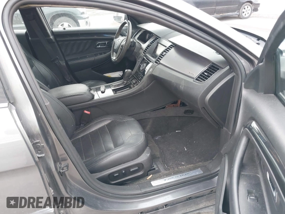 2014 Ford Taurus SHO with VIN 1FAHP2KTXEG160800, listed as a IAAI auction lot 42083237 with 75,048 mi miles. Bid and sale history available at carsss.com. Image 5.