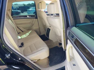 2013 Volkswagen Touareg Lux with VIN WVGEF9BP6DD004454, listed as a IAAI auction lot 41862958 with 239,548 mi miles and . Bid and sale history available at DreamBid. Image 8.