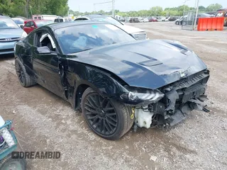 2018 Ford Mustang GT z VIN 1FA6P8CF2J5162419, wystawiony jako IAAI lot #39831527 z przebiegiem 46 058 mil mil oraz . Historia ofert i sprzedaży dostępna na DreamBid. Obrazek 1.