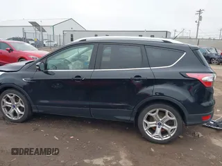 2017 Ford Escape Titanium with VIN 1FMCU0J95HUD37858, listed as a IAAI auction lot 41984629 with 87,163 mi miles and . Bid and sale history available at DreamBid. Image 13.