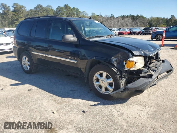 2006 GMC Envoy SLT with VIN 1GKDT13S462359008, listed as a Copart auction lot 80014324 with 158,906 mi miles and Salvage Title. Bid and sale history available at carsss.com. Image 4.