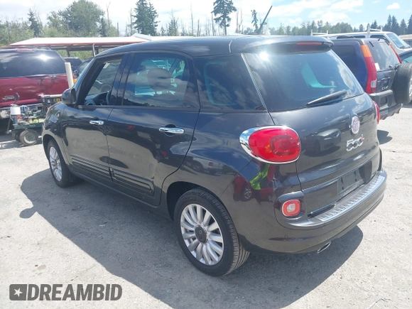 2014 FIAT 500L Easy with VIN ZFBCFABH0EZ028102, listed as a IAAI auction lot 42721149 with 115,137 mi miles and . Bid and sale history available at DreamBid. Image 3.