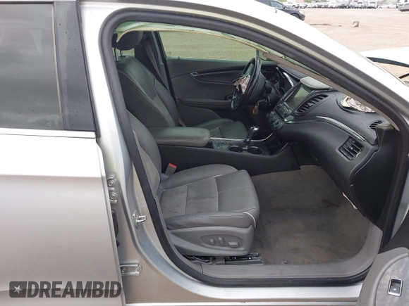 2014 Chevrolet Impala LT with VIN 2G1125S38E9102607, listed as a IAAI auction lot 41860235 with 128,599 mi miles and . Bid and sale history available at DreamBid. Image 5.