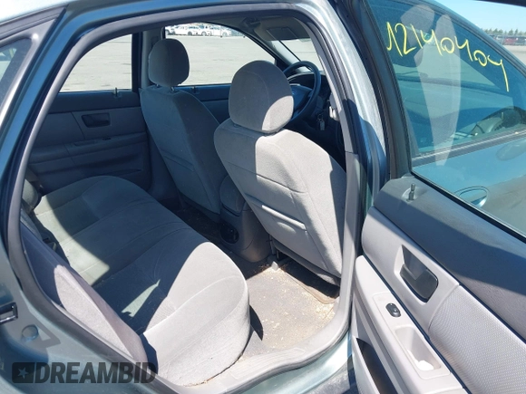 2005 Ford Taurus SE with VIN 1FAFP53U05A273576, listed as a IAAI auction lot 42140404 with 58,735 mi miles. Bid and sale history available at carsss.com. Image 8.