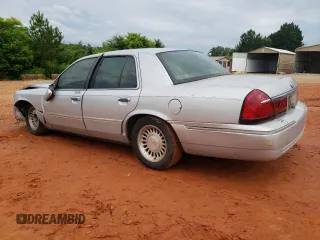 1999 Mercury Grand Marquis LS z VIN 2MEFM75W3XX617388, wystawiony jako Copart lot #58811195 z przebiegiem 162 600 mil mil oraz Szkoda całkowita • Salvage title. Historia ofert i sprzedaży dostępna na DreamBid. Obrazek 2.