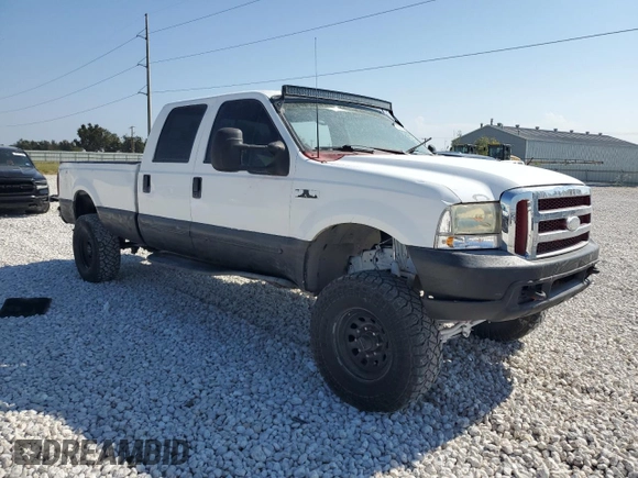 2000 Ford Super Duty F-250 XL with VIN 1FTNW21SXYEA52699, listed as a Copart auction lot 78659054 with 154,056 mi miles and Salvage Title. Bid and sale history available at carsss.com. Image 4.
