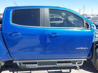 2019 GMC Canyon 4WD SLE z VIN 1GTG6CENXK1222416, wystawiony jako IAAI lot #41878077 z przebiegiem 85 415 mil mil oraz . Historia ofert i sprzedaży dostępna na DreamBid. Obrazek 14.