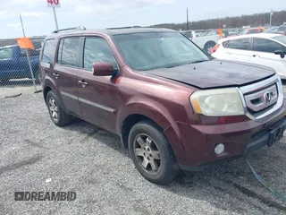 2010 Honda Pilot Touring with VIN 5FNYF4H95AB040721, listed as a IAAI auction lot 41928412 with 213,219 mi miles and . Bid and sale history available at carsss.com. Image 1.