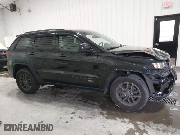 2016 Jeep Grand Cherokee 75th Anniversary z VIN 1C4RJFAG8GC476475, wystawiony jako IAAI lot #41509557 z przebiegiem 94 621 mil mil oraz . Historia ofert i sprzedaży dostępna na DreamBid. Obrazek 14.