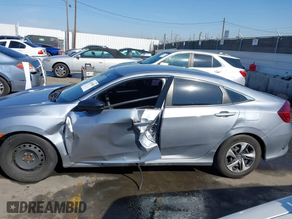 2020 Honda Civic LX with VIN 2HGFC2F6XLH533726, listed as a IAAI auction lot 41633882 with 141,835 mi miles and . Bid and sale history available at DreamBid. Image 14.