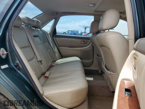 2003 Toyota Avalon XL z VIN 4T1BF28BX3U310285, wystawiony jako Copart lot #57664375 z przebiegiem 179 727 mil mil oraz Szkoda całkowita • Salvage title. Historia ofert i sprzedaży dostępna na DreamBid. Obrazek 10.