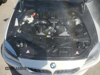 2016 BMW M6 z VIN WBS6E9C55GGF92676, wystawiony jako Copart lot #77663924 z przebiegiem 36 548 mil mil oraz Szkoda całkowita • Salvage title. Historia ofert i sprzedaży dostępna na DreamBid. Obrazek 11.